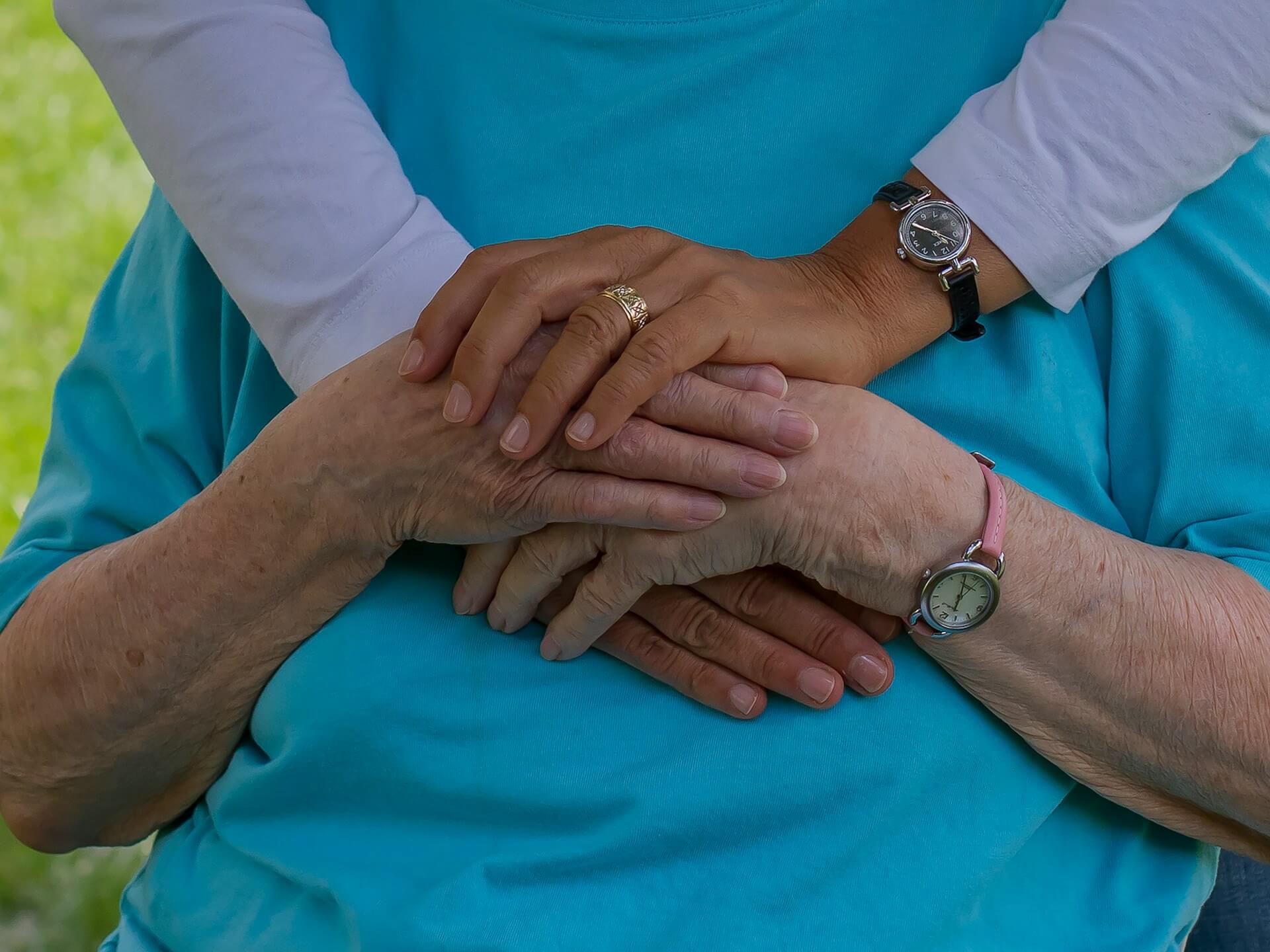 Caregiver supporting a loved one through cancer treatment